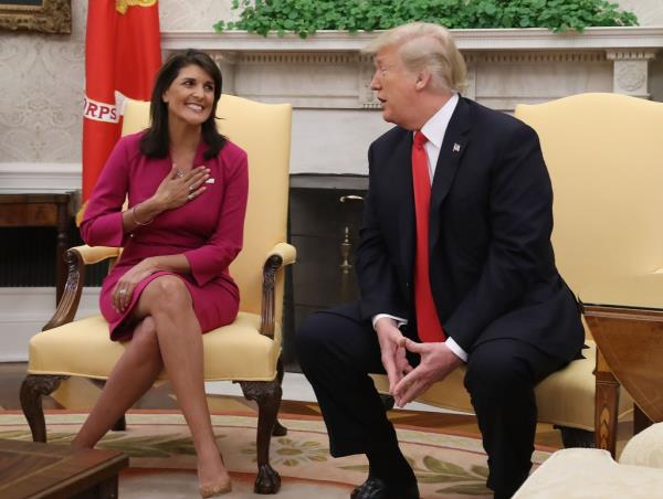 U.S. President Do<em></em>nald Trump announces that he has accepted the resignation of Nikki Haley as US Ambassador to the United Nations, in the Oval Office on October 9, 2018.