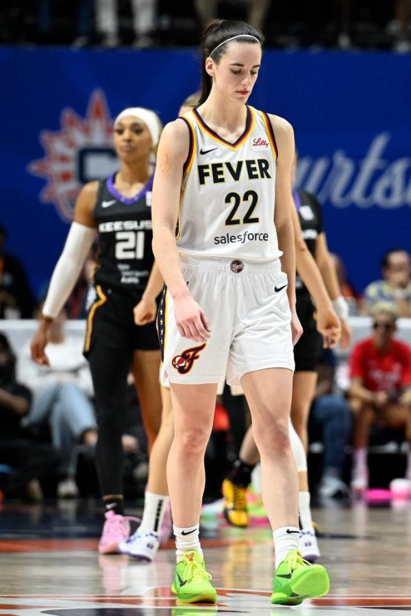 Indiana Fever guard Caitlin Clark (22) walks down the court after a turnover against the Co<em></em>nnecticut Sun during the second quarter of a WNBA basketball game, Tuesday, May 14, 2024, in Uncasville, Conn. 