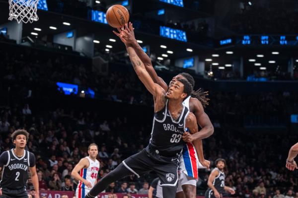 Nets center Nic Claxton (33) defends Detroit Pistons center Isaiah Stewart (28) in the first half at Barclays Center, Saturday, Dec. 23, 2023