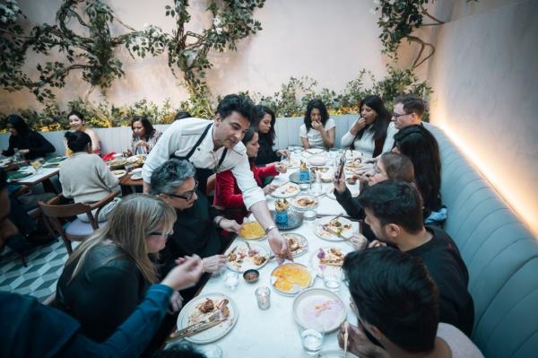Khanna entertaining the customers. 