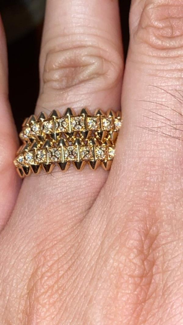 Villarreal wearing the $14 Cartier earrings on his finger as a ring. 