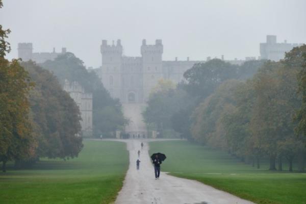 Mandatory Credit: Photo by Geoffrey Swaine/Shutterstock (14146327q) People out on a misty, rainy day along the Long Walk in Windsor Great Park. Seaso<em></em>nal weather, Windsor, Berkshire, UK - 12 Oct 2023