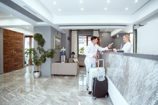 Guests checking into a hotel