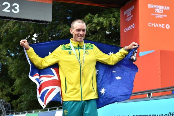 Gold medal winner Rohan Dennis of Australia poses after the men's cycling individual time trials at the Commo<em></em>nwealth Games in West Park, Wolverhampton, England, Thursday, Aug. 4, 2022. (AP Photo/Rui Vieira)