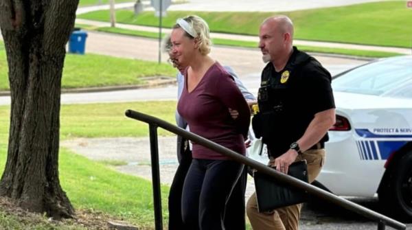 Alissa McCommon being taken into custody