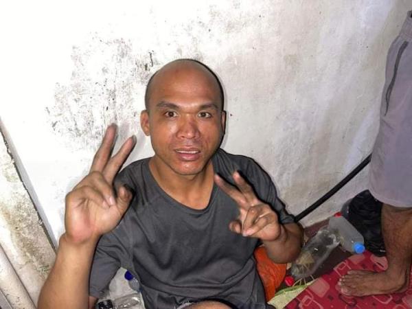 Godiflor Rama seen in police custody 