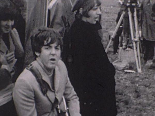 Beatles Paul McCartney and Ringo Starr in between takes of filming 