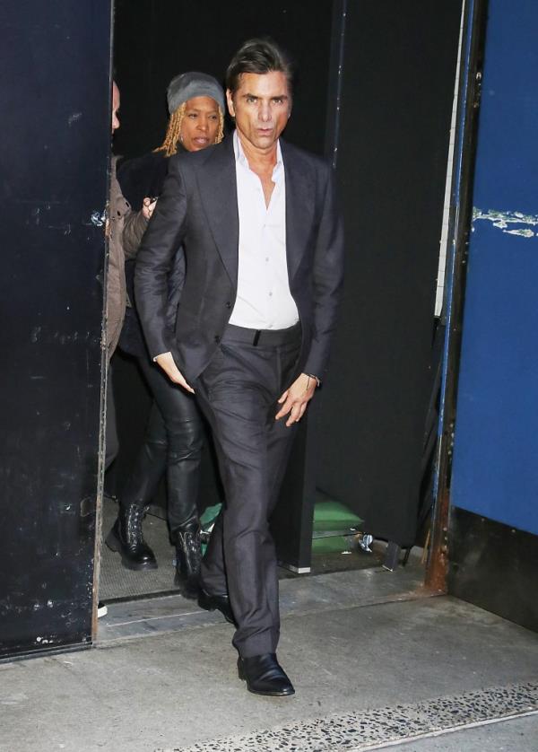 John Stamos walking. 
