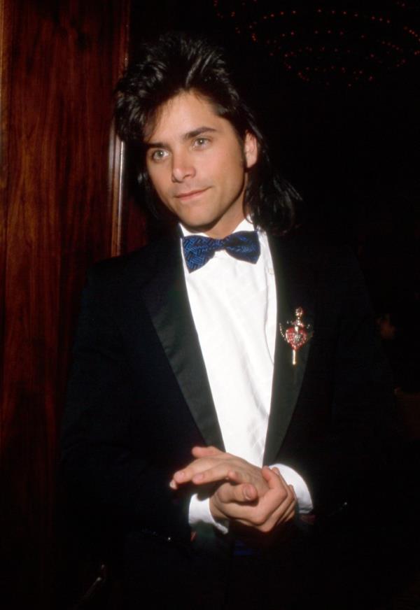 John Stamos in a tux in the 90s. 