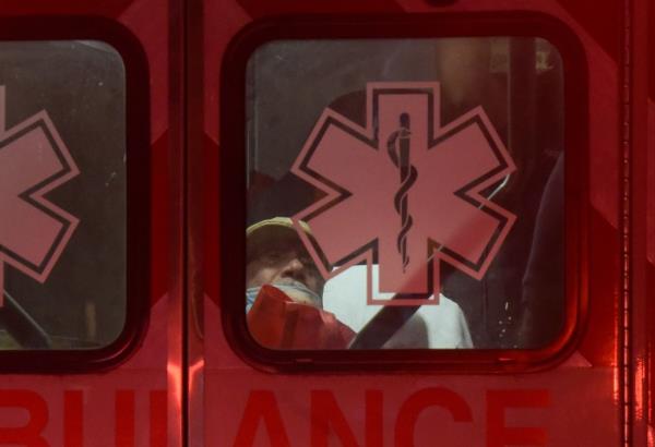 The suspect was taken to the ambulance with a cut on his hand that was possibly self-inflicted, cops said.