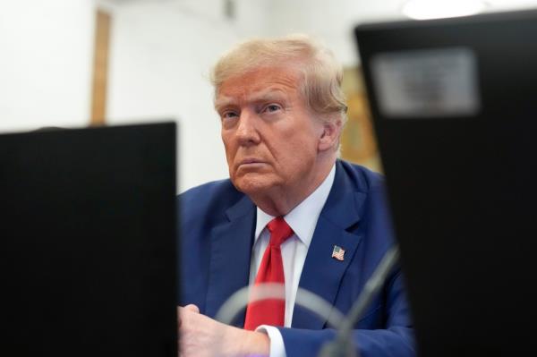 Former President Do<em></em>nald Trump sits in the courtroom before the start of closing arguments in his civil business fraud trial at New York Supreme Court, Jan. 11, 2024, in New York.