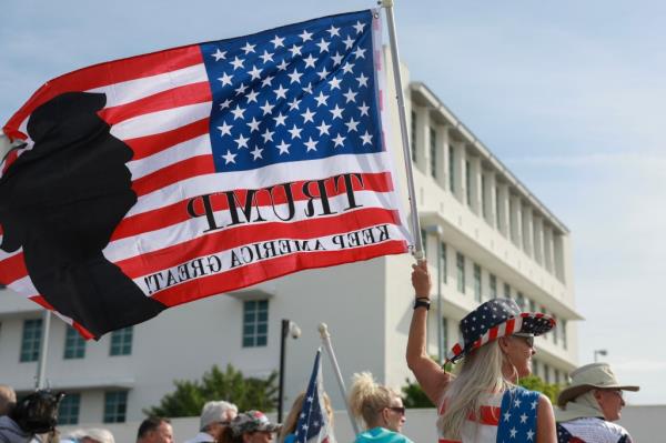 Supporters of former U.S. President Do<em></em>nald Trump stand outside of the Alto Lee Adams Sr. U.S. Courthouse as they await his arrival on March 01, 2024 in Fort Pierce, Florida.