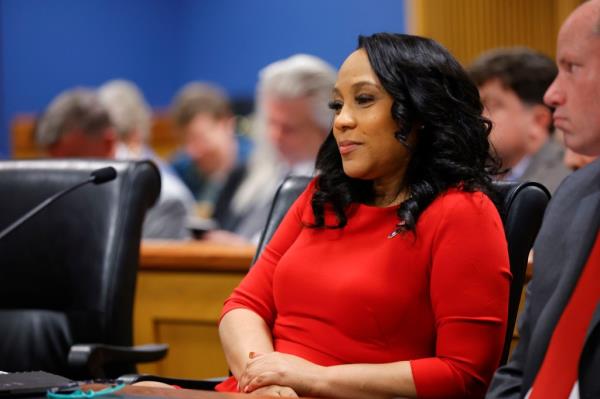 Fulton County District Attorney Fani Willis looks on during a hearing in the case of the State of Georgia v. Do<em></em>nald John Trump at the Fulton County Courthouse.