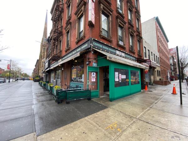 Empty street outside Harlem Shake restaurant in New York City during COVID-19 shutdown.