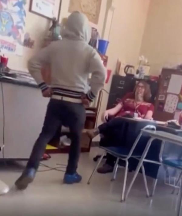 Aquavis Hickman approaches teacher. 