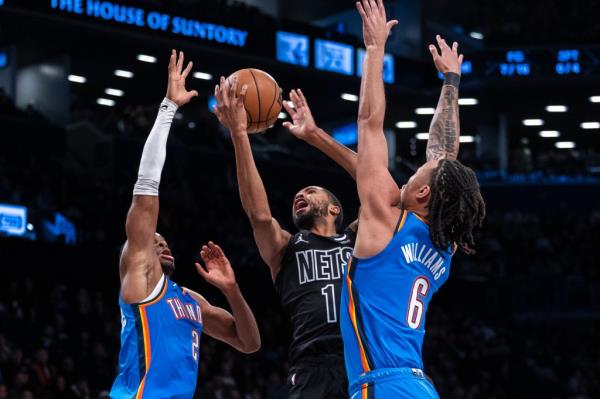Mikal Bridges #1 of the Brooklyn Nets drives to the basket as Jaylin Williams #6 of the Oklahoma City Thunder defends in the first half at Barclays Center, Friday, Jan. 5, 2024