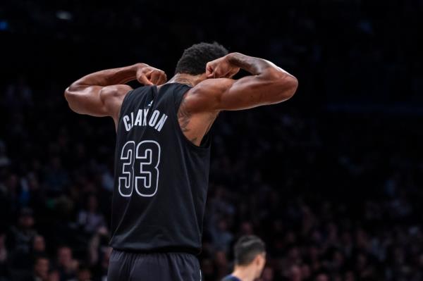 Nic Claxton #33 of the Brooklyn Nets reacts after he hits a shot in the first half at Barclays Center.