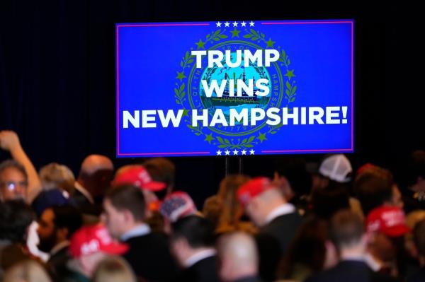 Supporters gather before Republican presidential candidate former President Do<em></em>nald Trump speaks at a primary election night party in Nashua, N.H., Tuesday, Jan. 23, 2024.