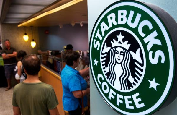 Starbucks is introducing changes to its coffee-making process that it hopes will cut down on customer wait times, according to a report.