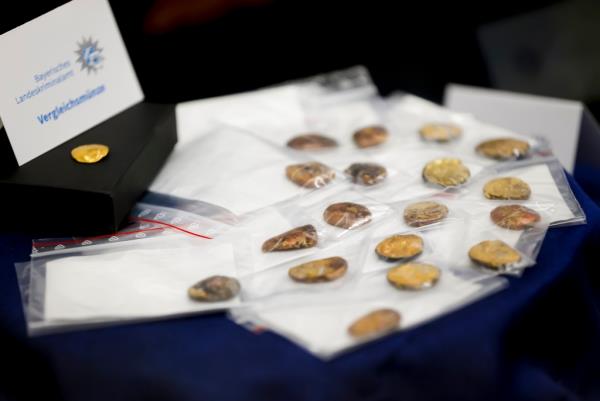 Investigators looking into the theft of hundreds of ancient gold coins from a German museum have found lumps of gold that appear to have resulted from part of the treasure being melted down.