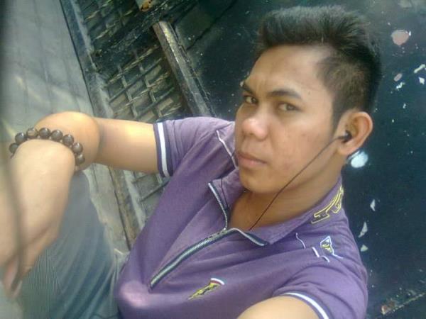 Cris John Pentinio poses for a selfie. 