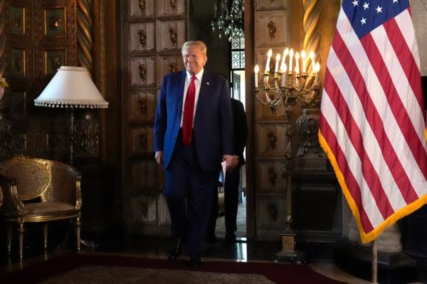 Former President Do<em></em>nald Trump arriving to speak at a news co<em></em>nference with Speaker of the House Mike Johnson at Mar-a-Lago, Palm Beach, 2024