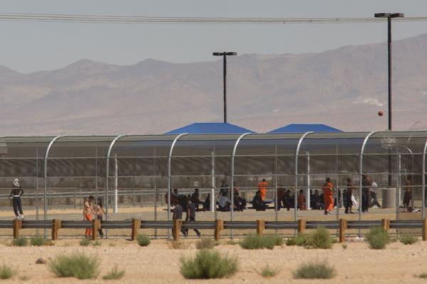 Impriso<em></em>ned immigrants are seen at the US Immigration and Customs Enforcement (ICE) Adelanto Detention Facility near the border of the 