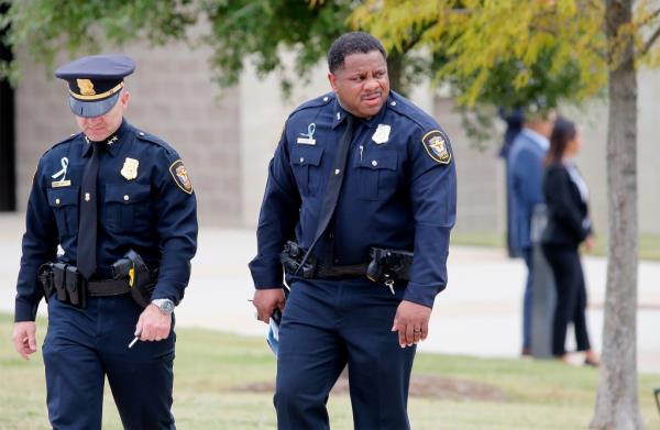 Forth Worth Police officers leave after the funeral service for Atatiana Jefferson on October 24, 2019, at Co<em></em>ncord Church in Dallas, Texas. On October 12, 2019.
