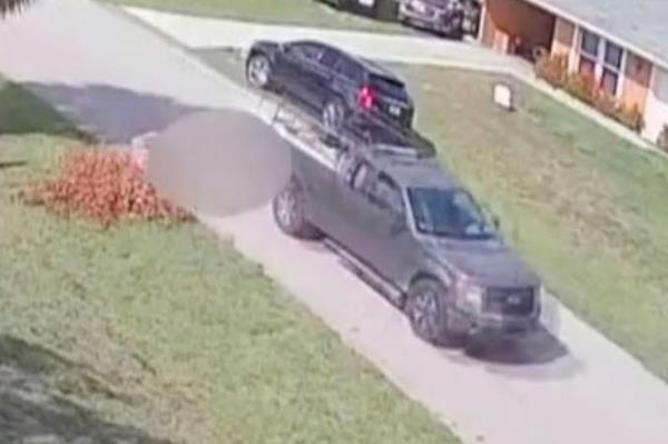 The truck dragging the dog