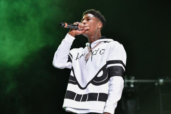NBA YoungBoy performs during Lil WeezyAna at Champions Square on August 25, 2018, in New Orleans.  