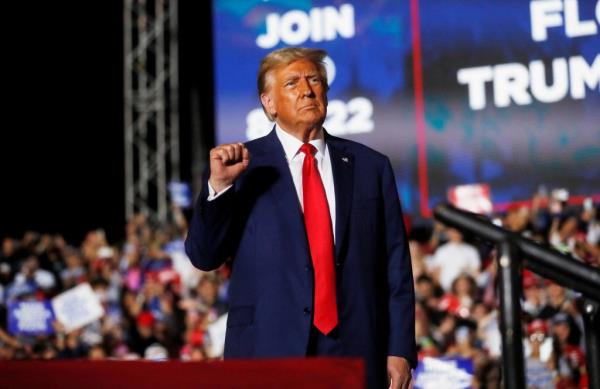 Do<em></em>nald Trump gestures during a campaign rally at Ted Hendricks Stadium in Hialeah, Florida.