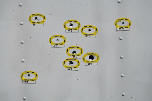 A truck parked at the scene was riddled with bullet holes in the wake of the shooting. 
