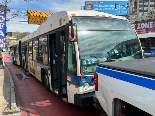 A bus parked on the side of a road