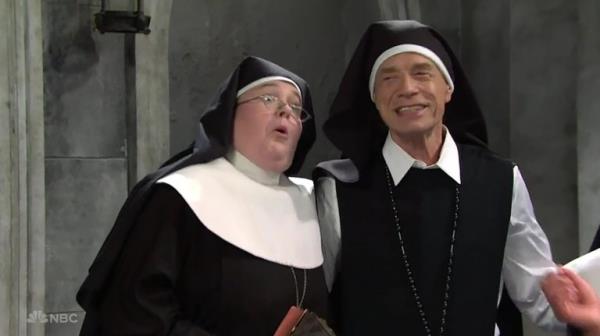 BGUK_2757253 - Los Angeles, CA - Mick Jagger pops up in a second SNL skit ? as a nun corrupting his fellow Sisters of God with his ?lips and hips?. The Rolling Sto<em></em>nes fro<em></em>ntman played the part of Sister Kevin in the hilarious - and raunchy - sketch who admits he infiltrated the co<em></em>nvent so he could defrock and frolick with the nuns. The skit kicks off with Mother Superior, played by Molly Kearney, gathering together the nuns to tell them that one of them is an imposter ? a man posing as a nun. Rapper and singer Bad Bunny is in the group but denied he?s the one who has been sleeping with all the sisters. Jagger ? dressed as a nun ? then enters and admits it?s him, declaring: ?I co<em></em>nfess is was me! I corrupted these poor women with my lips and my hips.? As all the nuns swoon, he continues: ?I rang the bell and yelled: ?Ding dong! As the Mother Superior asks him why, Jagger responds: ?This is the worst scandal in the history of the church! Before these nuns mumbled: ?My father but now they are screaming: ?Oh God! Mother Superior exclaims: ?Sister Kevin!? while all the other nuns beg and plead to let him stay on and keeping sleeping with them. One of the says: ?It is Halloween next week!? There?s more pleading before Jagger says: ?Now I?m ready for the second coming!? and Mother Superior gives in, saying: ?Oh, F it, he can stay!? Earlier in the evening Jagger appeared in another sketch alo<em></em>ngside host Bad Bunny as a villainous 'Papa' on a cheesy Tele Novella soap opera. *BACKGRID DOES NOT CLAIM ANY COPYRIGHT OR LICENSE IN THE ATTACHED MATERIAL. ANY DOWNLOADING FEES CHARGED BY BACKGRID ARE FOR BACKGRID'S SERVICES ONLY, AND DO NOT, NOR ARE THEY INTENDED TO, Co<em></em>nVEY TO THE USER ANY COPYRIGHT OR LICENSE IN THE MATERIAL. BY PUBLISHING THIS MATERIAL , THE USER EXPRESSLY AGREES TO INDEMNIFY AND TO HOLD BACKGRID HARMLESS FROM ANY CLAIMS, DEMANDS, OR CAUSES OF ACTION ARISING OUT OF OR Co<em></em>nNECTED IN ANY WAY WITH USER'S PUBLICATION OF THE MATERIAL* Pictured: Mick Jagger, Molly Kearney BACKGRID UK 22 OCTOBER 2023 BYLINE MUST READ: NBC / BACKGRID UK: +44 208 344 2007 / uksales@backgrid.com USA: +1 310 798 9111 / usasales@backgrid.com *Pictures Co<em></em>ntaining Children Please Pixelate Face Prior To Publication*