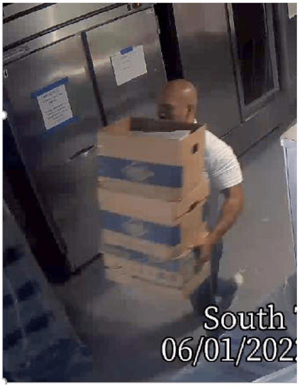 Man leaving with boxes