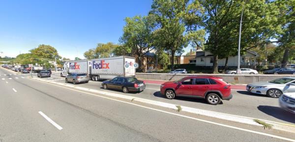 The intersection of Woodhaven Boulevard mid-block near 91st Avenue is pictured in a Google Streetview.