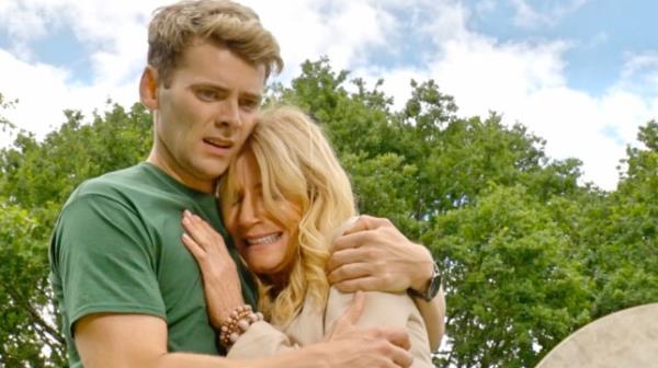 Cindy Beale breaks down in Peters' arms at the graveyard in EastEnders