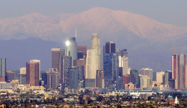 Downtown Los Angeles skyline with the snow-covered San Gabriel Mountains in the background, photo taken on February 7, 2019