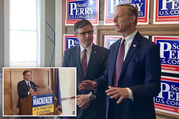 Speaker of the House Mike campaigns for Ryan Mackenzie in Pennsylvania's 7th co<em></em>ngressional district on Thursday at a podium.