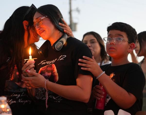 Jocelyn's mother mourns at a memorial for her 12-year-old daughter, murdered allegedly by a pair of illegal immigrants