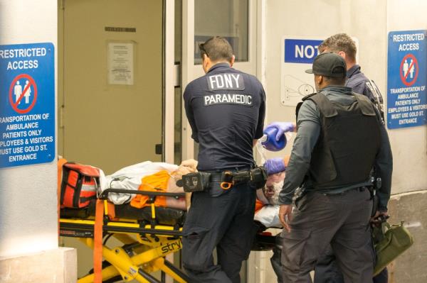 Epstein's dead body after her apparently hung himself in Federal Manhattan Detention Complex in August 2019