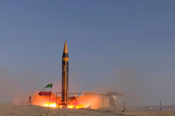 In this picture released by the Iranian Defense Ministry on Thursday, May 25, 2023, Khorramshahr-4 missile is launched at an undisclosed location, Iran.