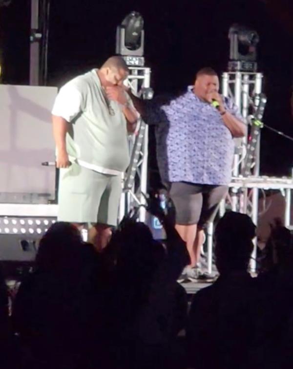 Rapper Fatman Scoop performing on stage before collapsing, with crowd being asked to pray for him