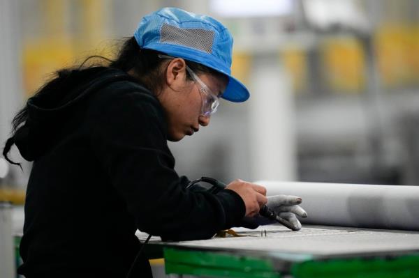 Factory worker in Dalton, Ga.