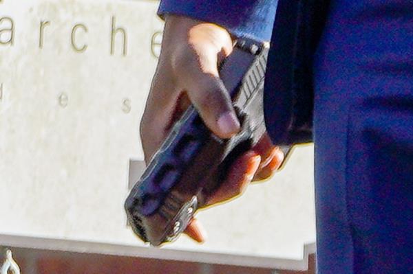 Nathan Wade appeared to be carrying a gun.