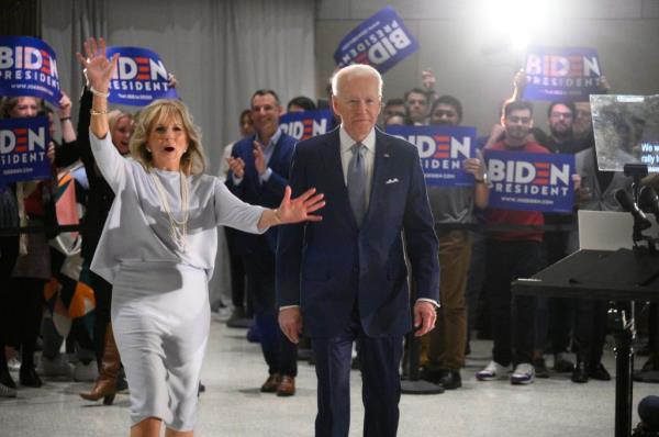 Joe and Jill Biden walking through a crowd at Natio<em></em>nal Co<em></em>nstitution Center after winning Michigan Primary, Philadelphia.