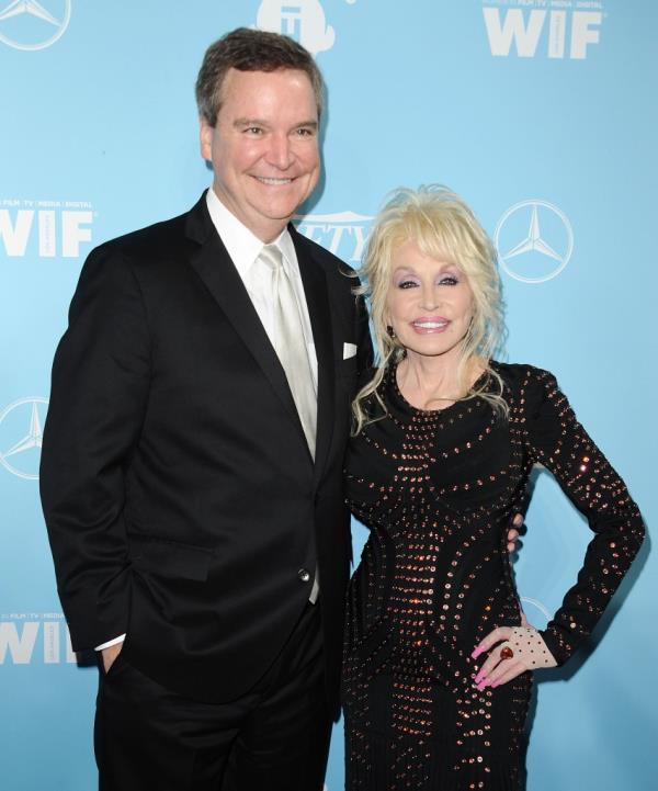 Dolly Parton and Sam Haskell attend Variety and Women In Film's 2017 pre-Emmy celebration at Gracias Madre on September 15, 2017 in West Hollywood, California.