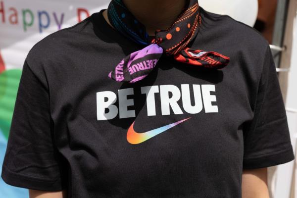 Footwear, apparel and equipment manufacturer Nike (USA) representative at Tokyo Rainbow Parade 2023. 