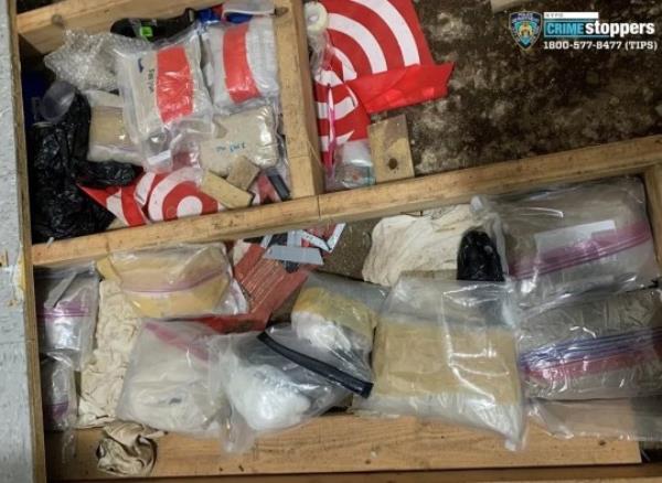 NYPD released photos of a trap door hiding drugs inside 2707 Morris Avenue at the Divino Nio Day Care in the Bronx. Additio<em></em>nal fentanyl, other narcotics and drug paraphernalia were found within the trap floor. The investigation remains ongoing. Carlisto Acevedo Brito and Grei Mendez De Ventura were arrested and charged.