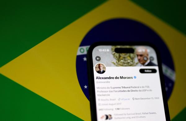 Mobile screen displaying the X social media account of Brazil's Supreme Court Justice Alexandre de Moraes